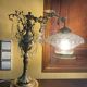 Bronze table lamp with dragon arm and cut glass shade, 1940s
