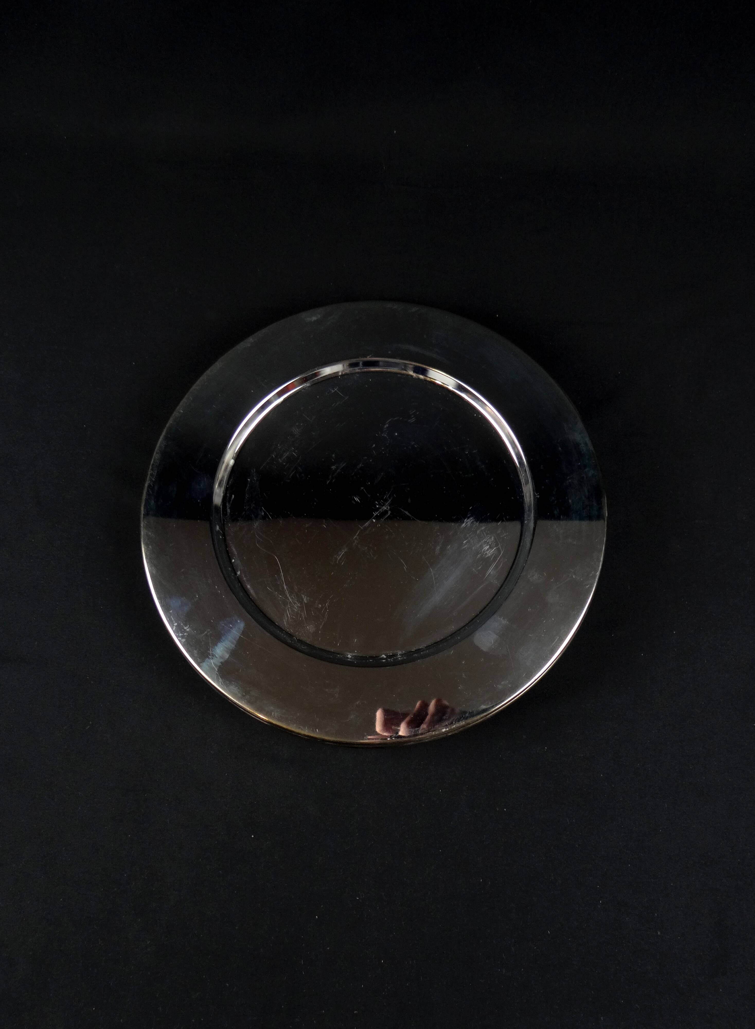 Set of 8 round serving platters or saucers in vintage stainless steel