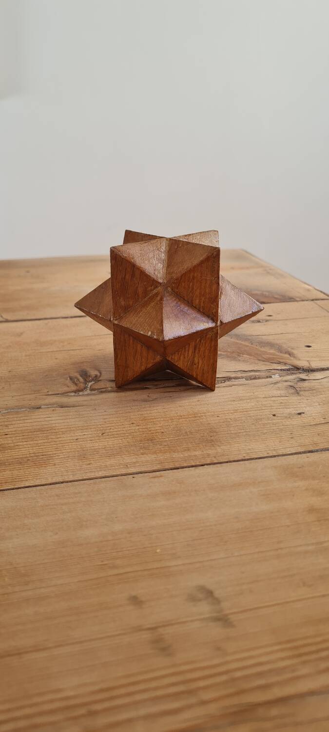 Sacndianve teak paperweight