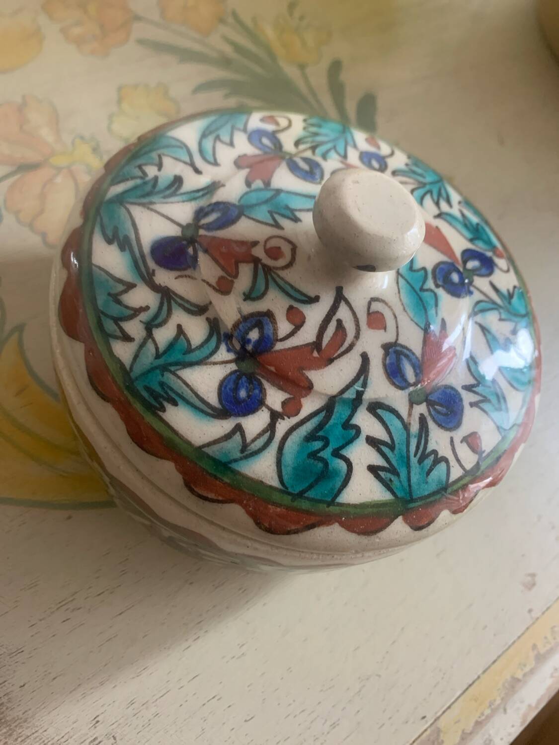 Glazed ceramic bonbonnière, hand-painted floral decoration.