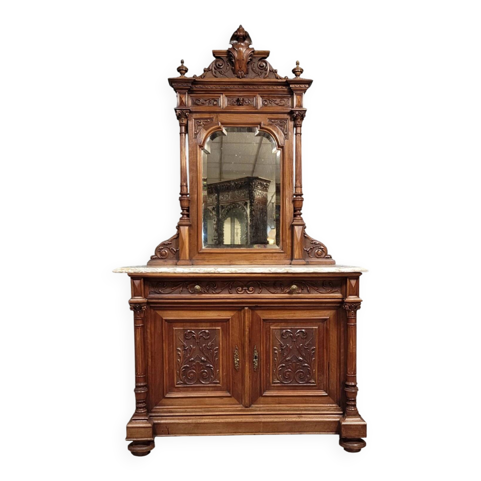 Buffet with mirror in Renaissance style, entirely made of solid walnut.