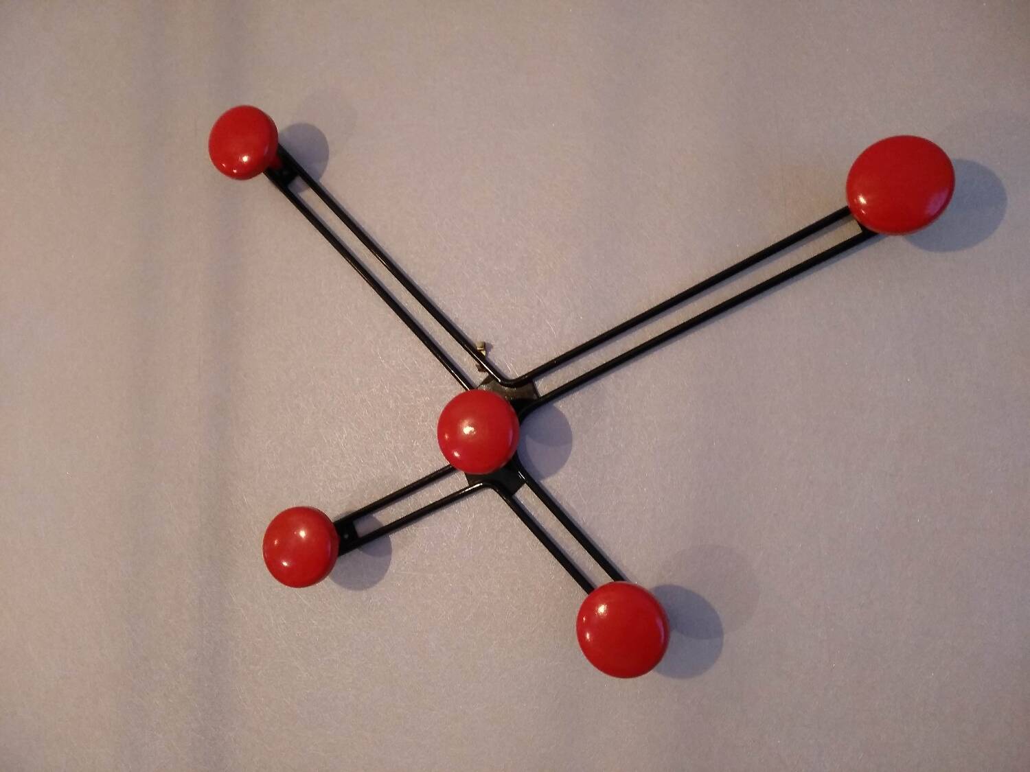 Wall-mounted metal coat rack with 5 hooks