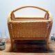Antique rattan magazine rack