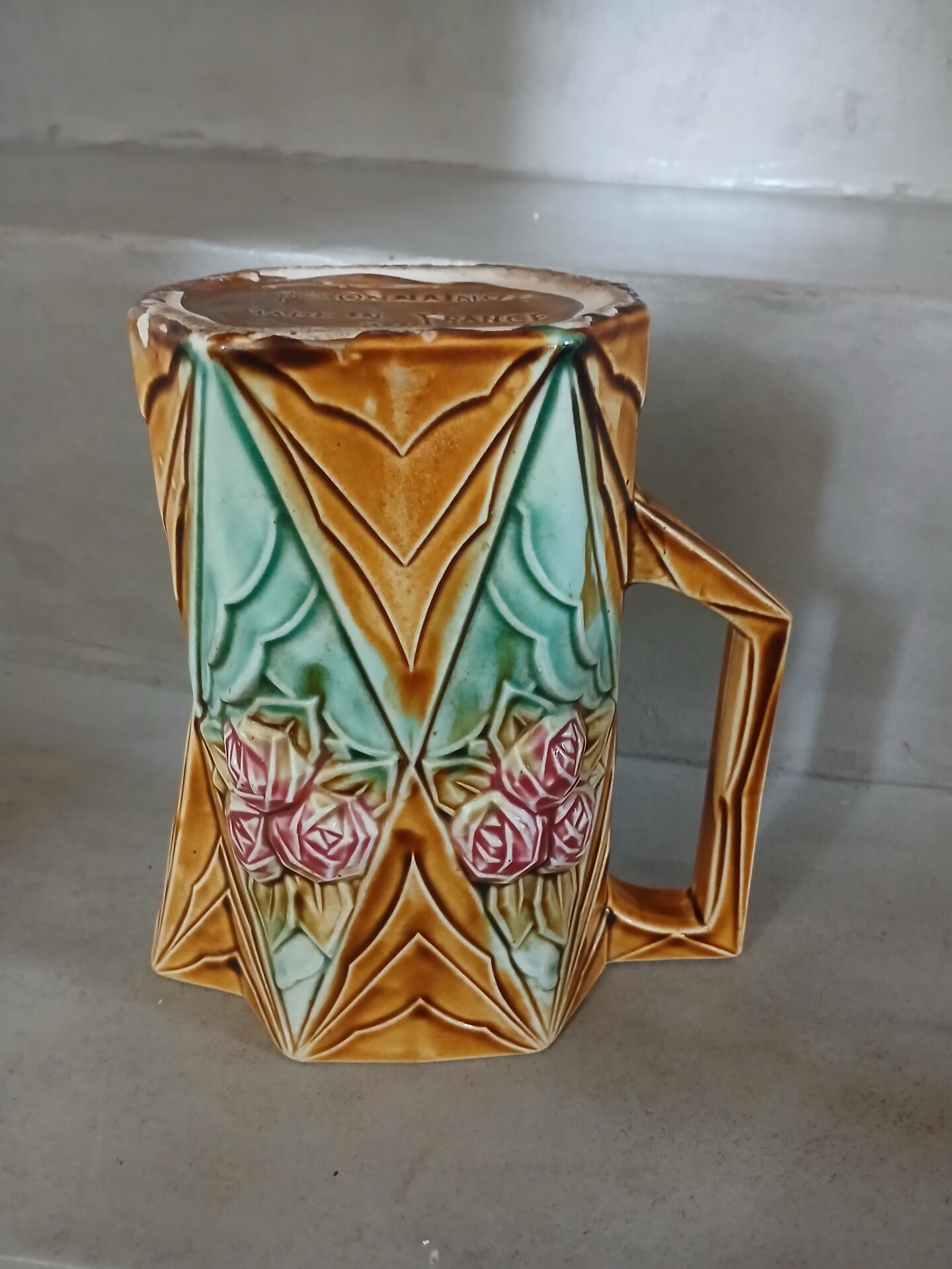 Antique pitcher in Onnaing slipware