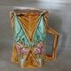 Antique pitcher in Onnaing slipware