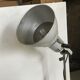 Industrial lamp on wrought iron tripod feet