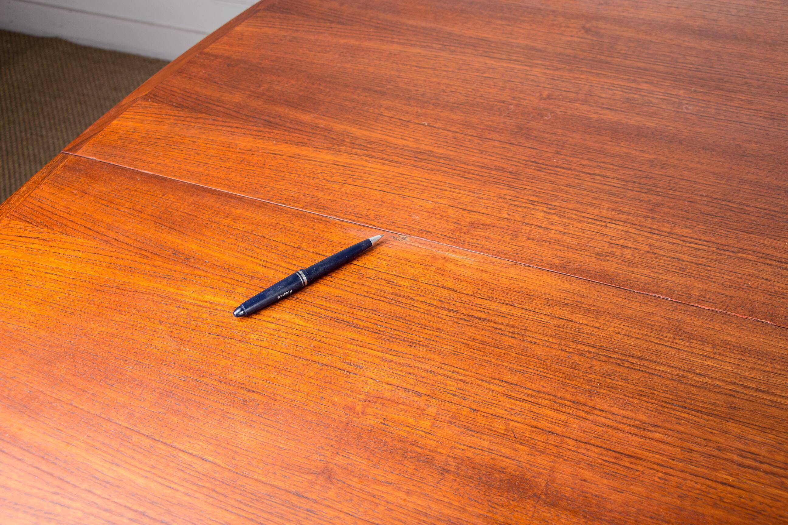 Expandable square teak dining table by Henry Walter Klein 1960