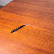 Expandable square teak dining table by Henry Walter Klein 1960