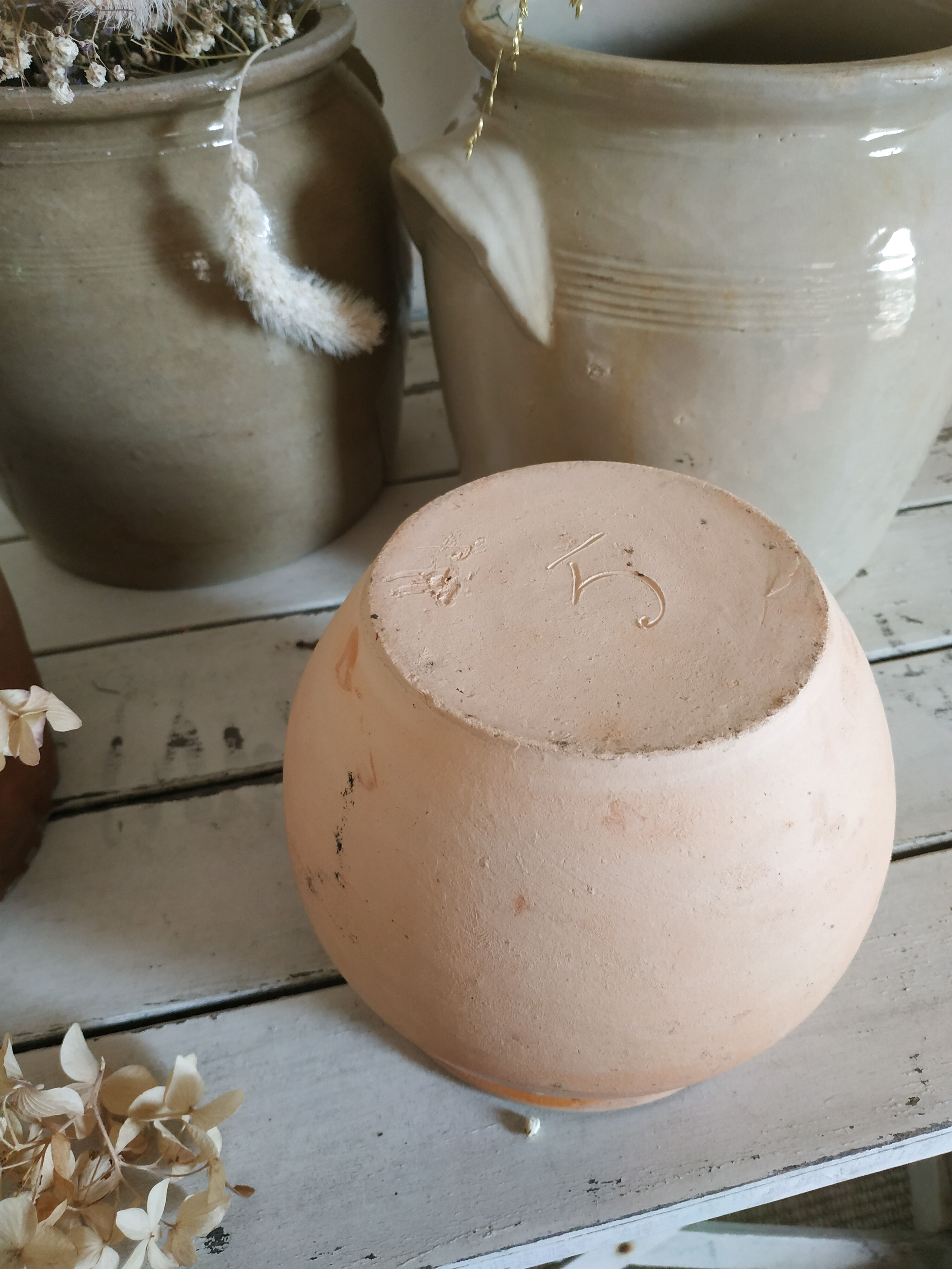 Old terracotta pot glazed ochre color