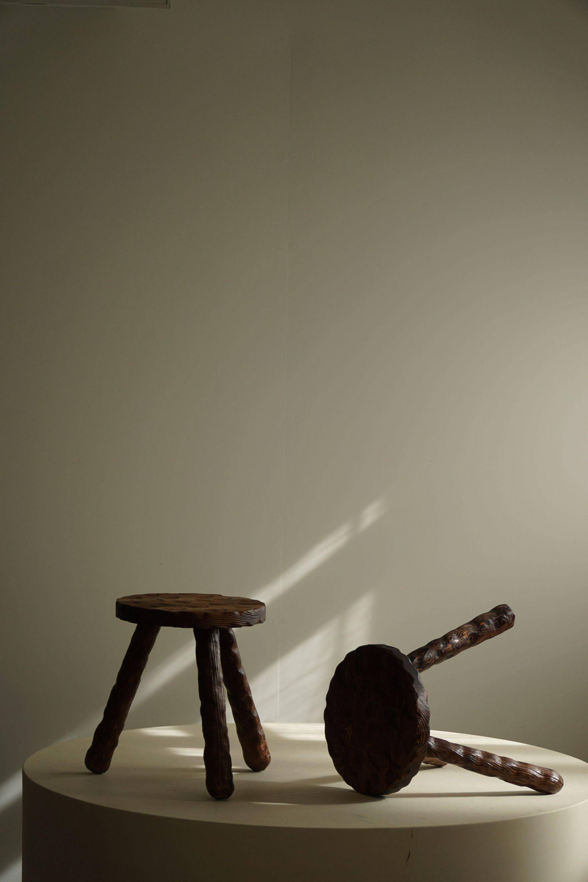 A pair of Wabi Sabi stools carved from pine, mid-century modern Swedish style, 1960s.
