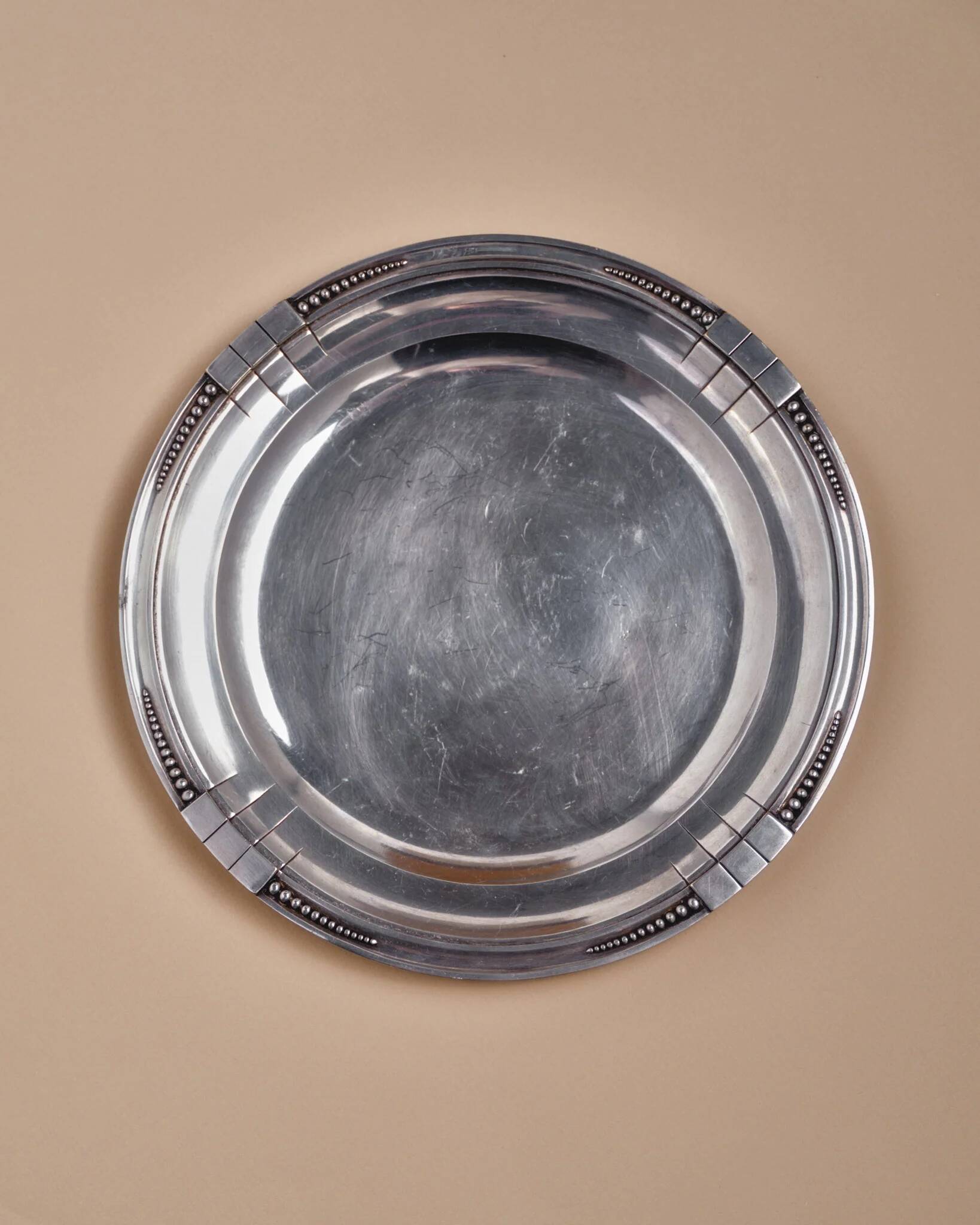 Round silver-plated metal dish, Samuel Askenfeld