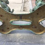 Coffee table with glass plate and bronze horses
