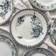6 mismatched Saint Amand ironware dessert plates