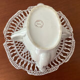 Old porcelain saucepan with fat/lean separator