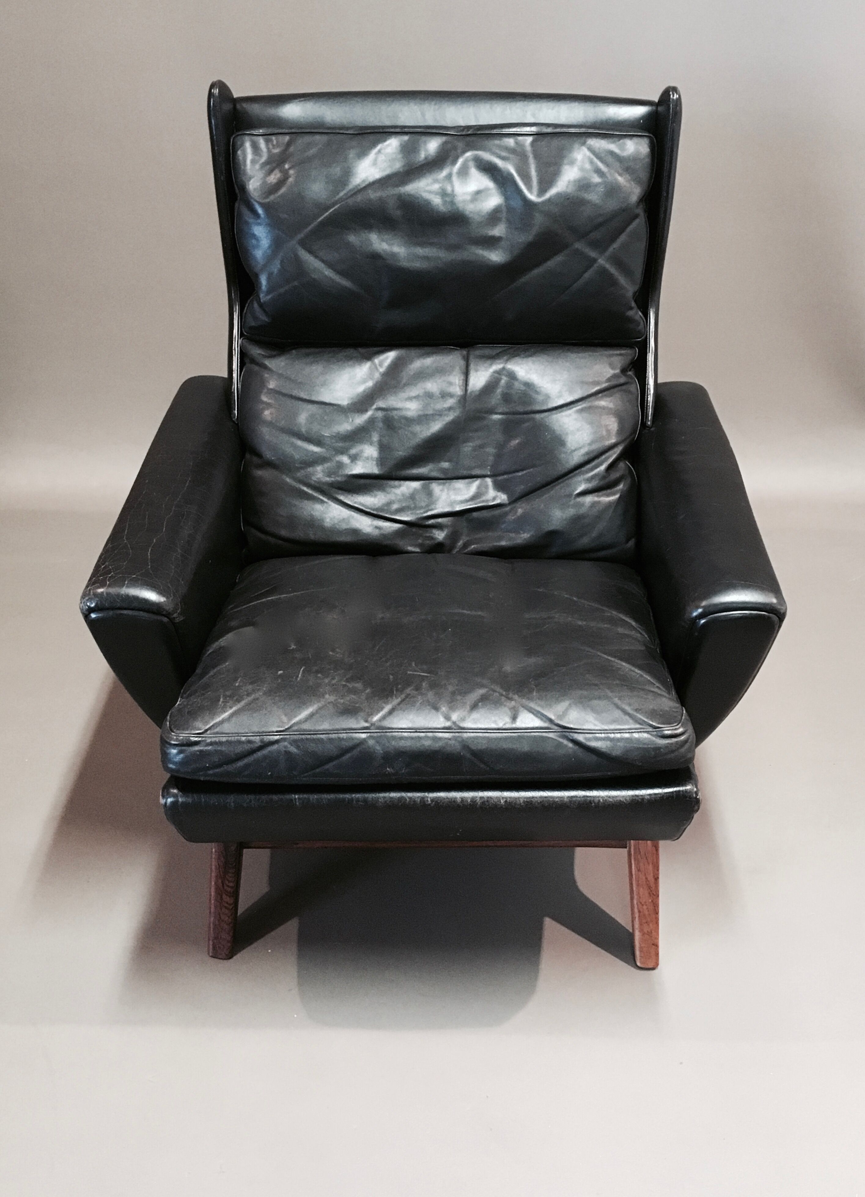 Rosewood armchair and black leather scandinavian 1950