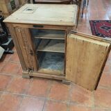 Antique cooler with a door