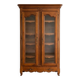 Louis XV style library in cherry wood with glass doors.