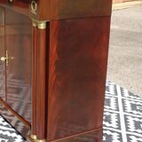 Flamed mahogany enfilade with sea green marble in Empire style.