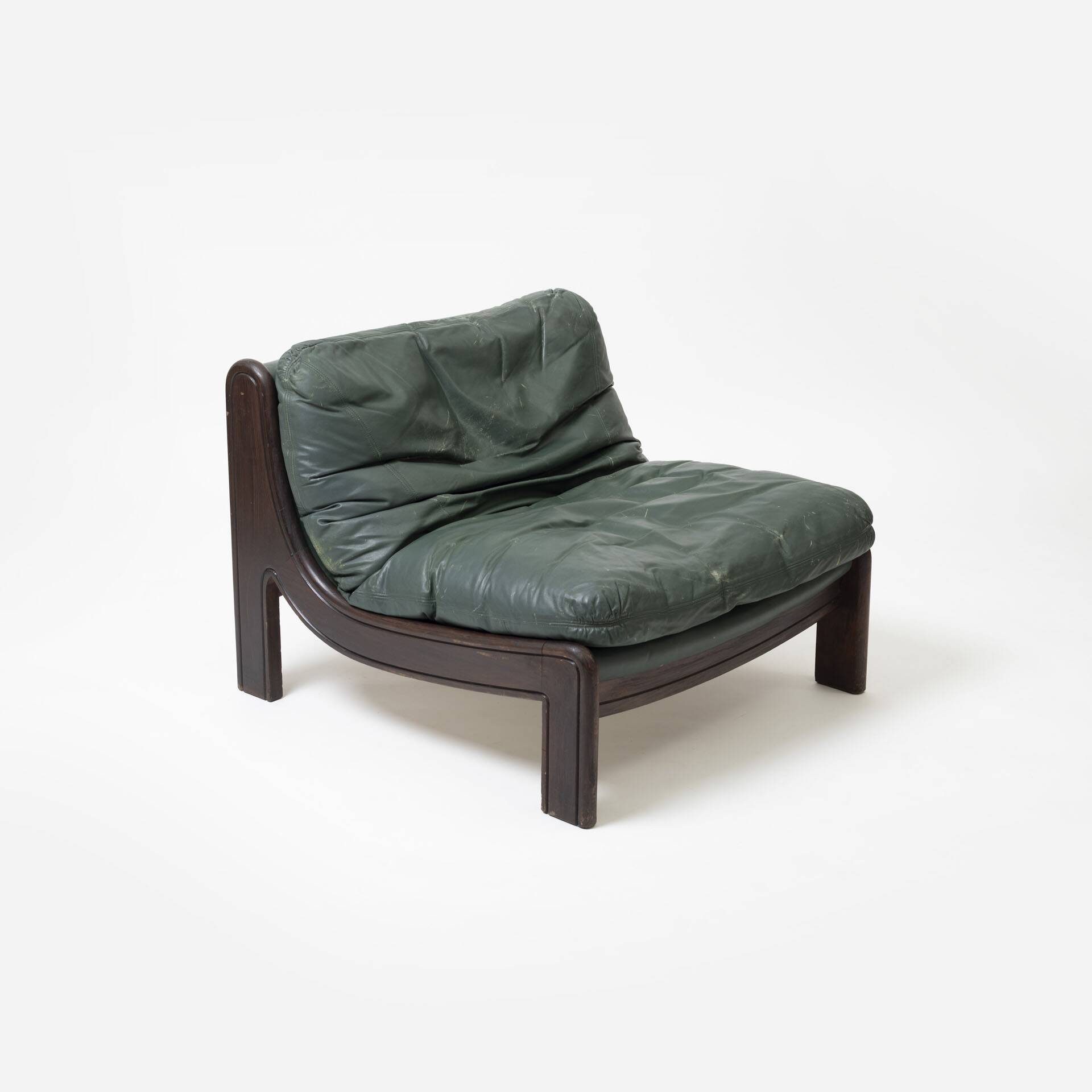 Pair of low sling chairs in hardwood and leather, Germany, 1970s