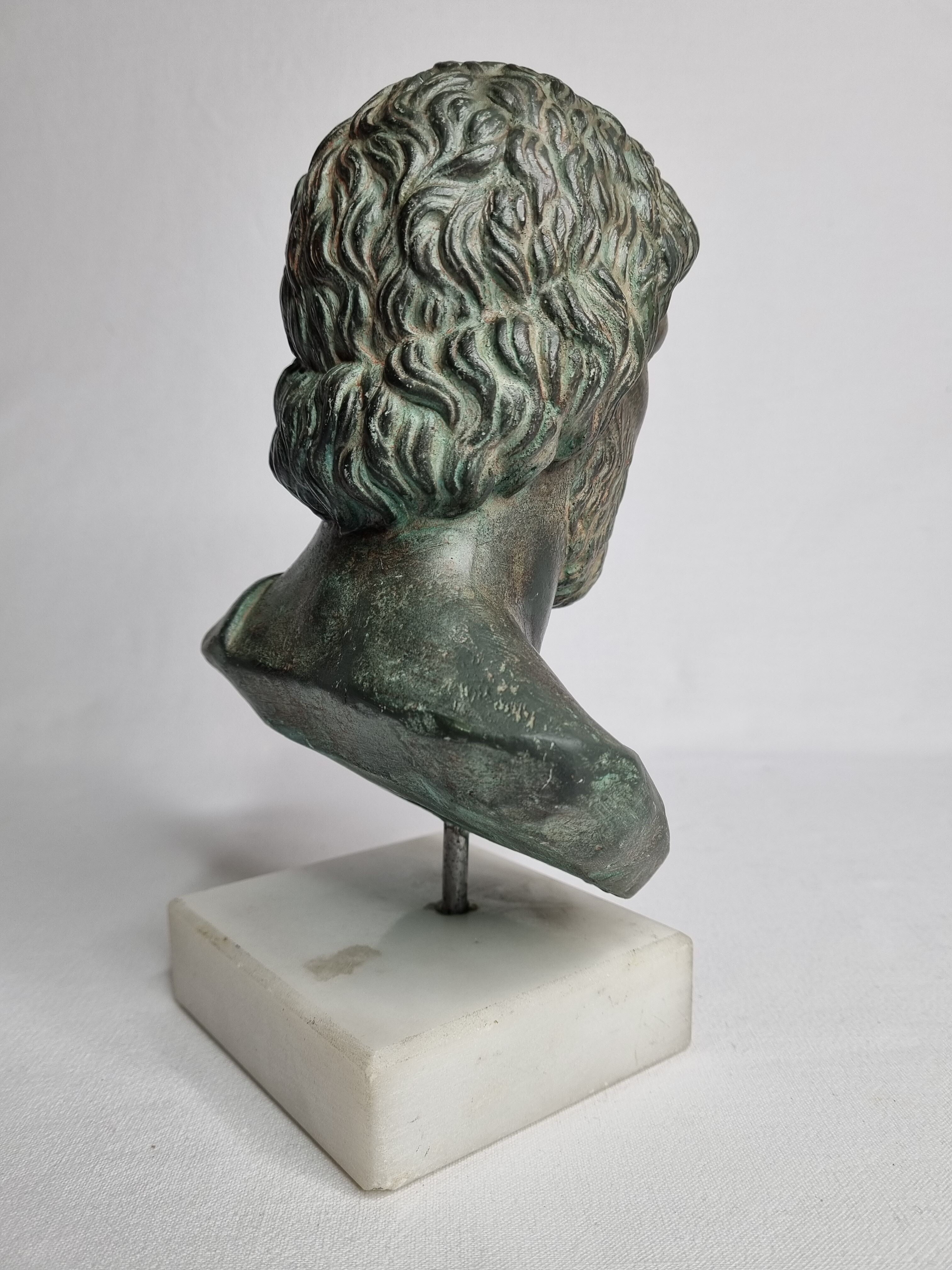 Bust of Esculape in patinated plaster on marble base, 21 cm