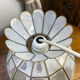 Suspension in white mother-of-pearl and brass