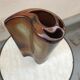 Free-form enamelled sandstone vase, circa 70/80