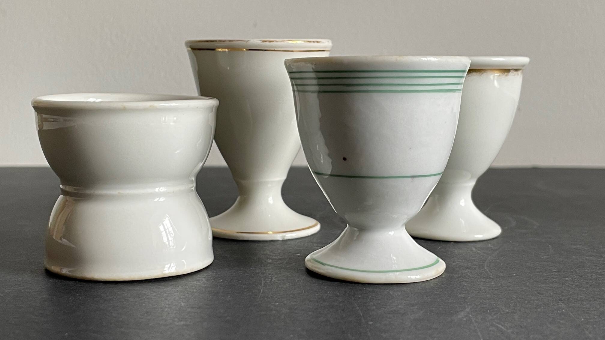 4 antique ceramic egg cups
