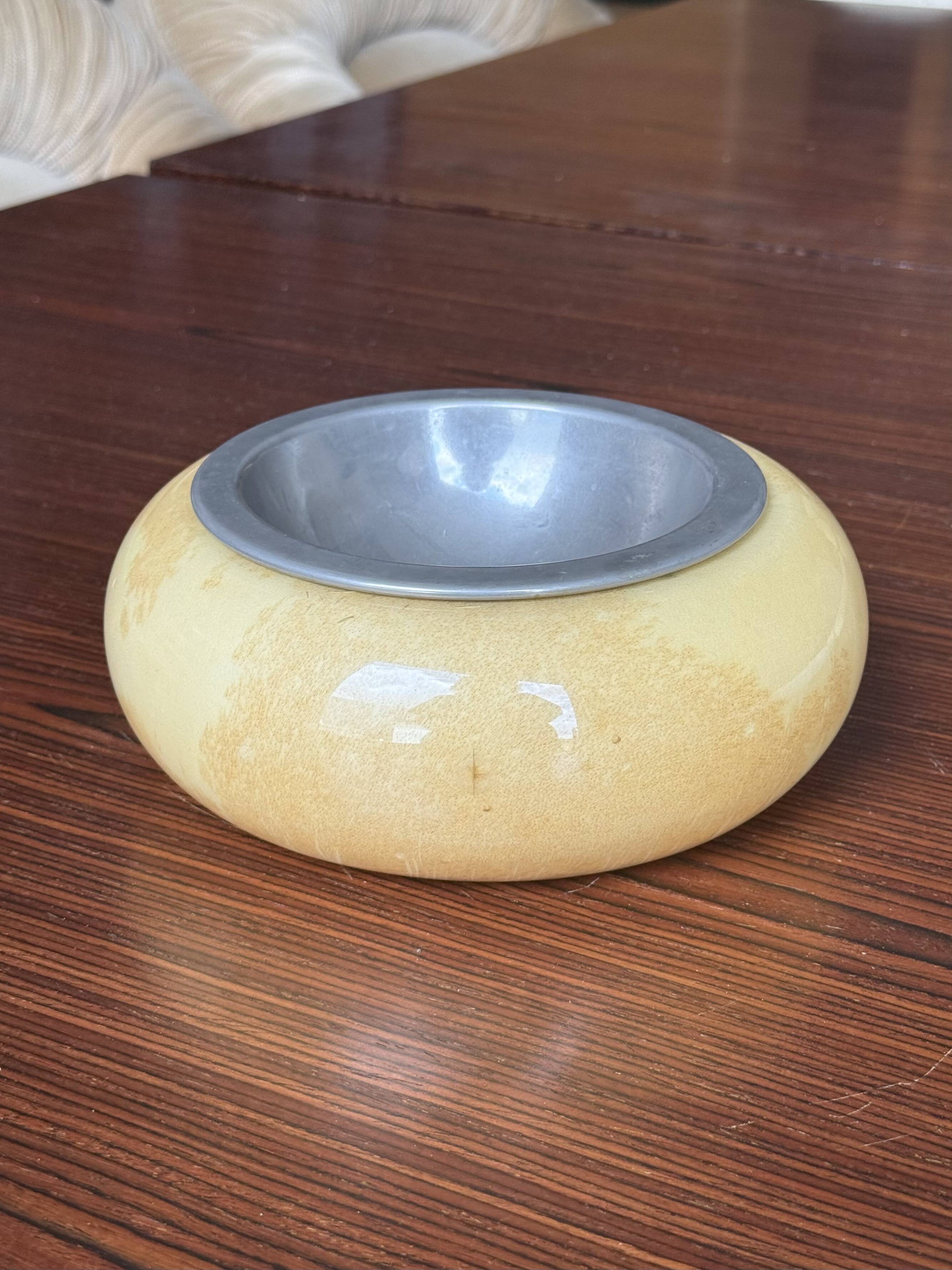 Set of two Aldo Tura bowls in goatskin and brass