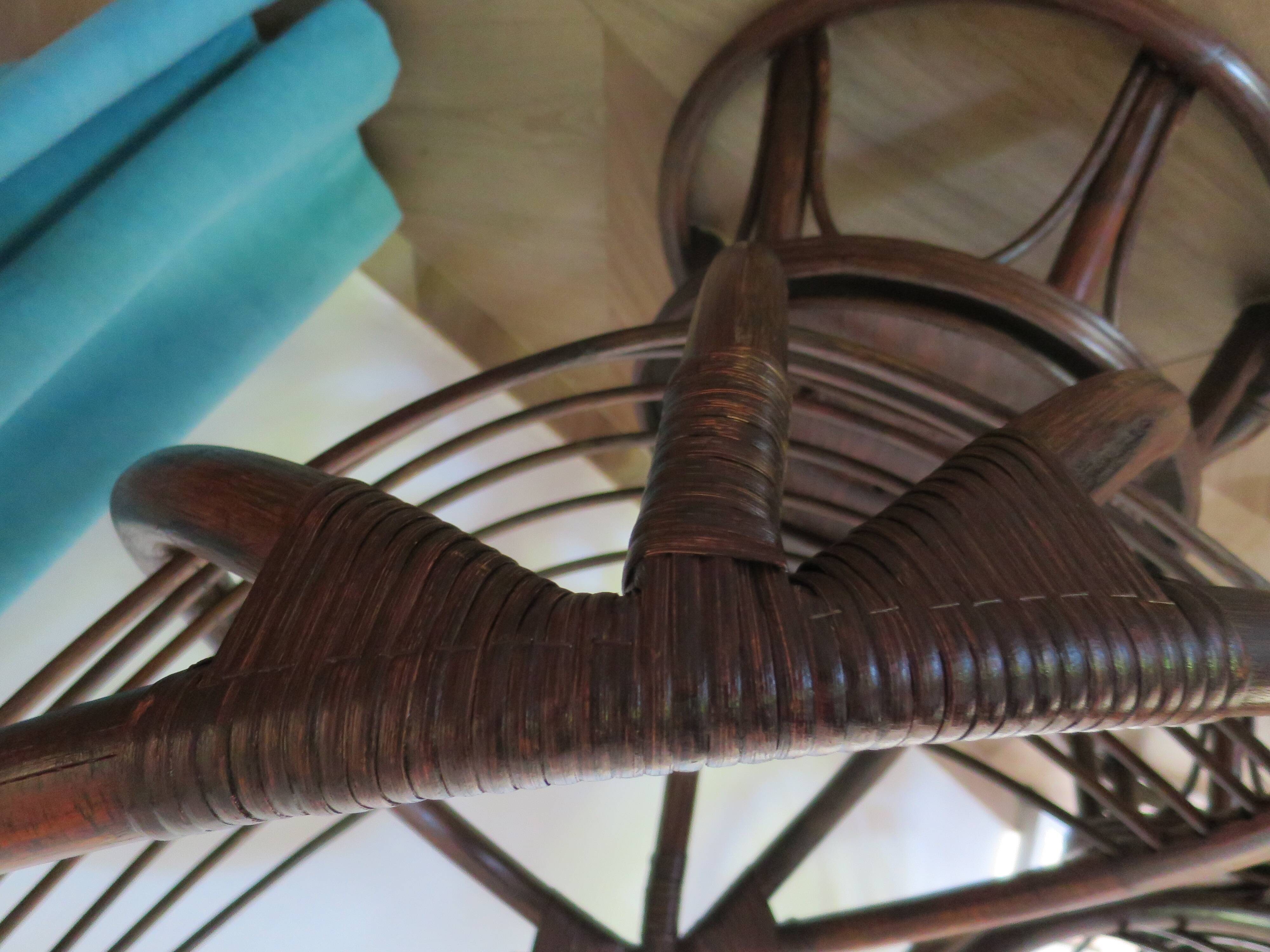 Vintage set of 2 swivel chairs in bamboo and rattan - Papasan shape