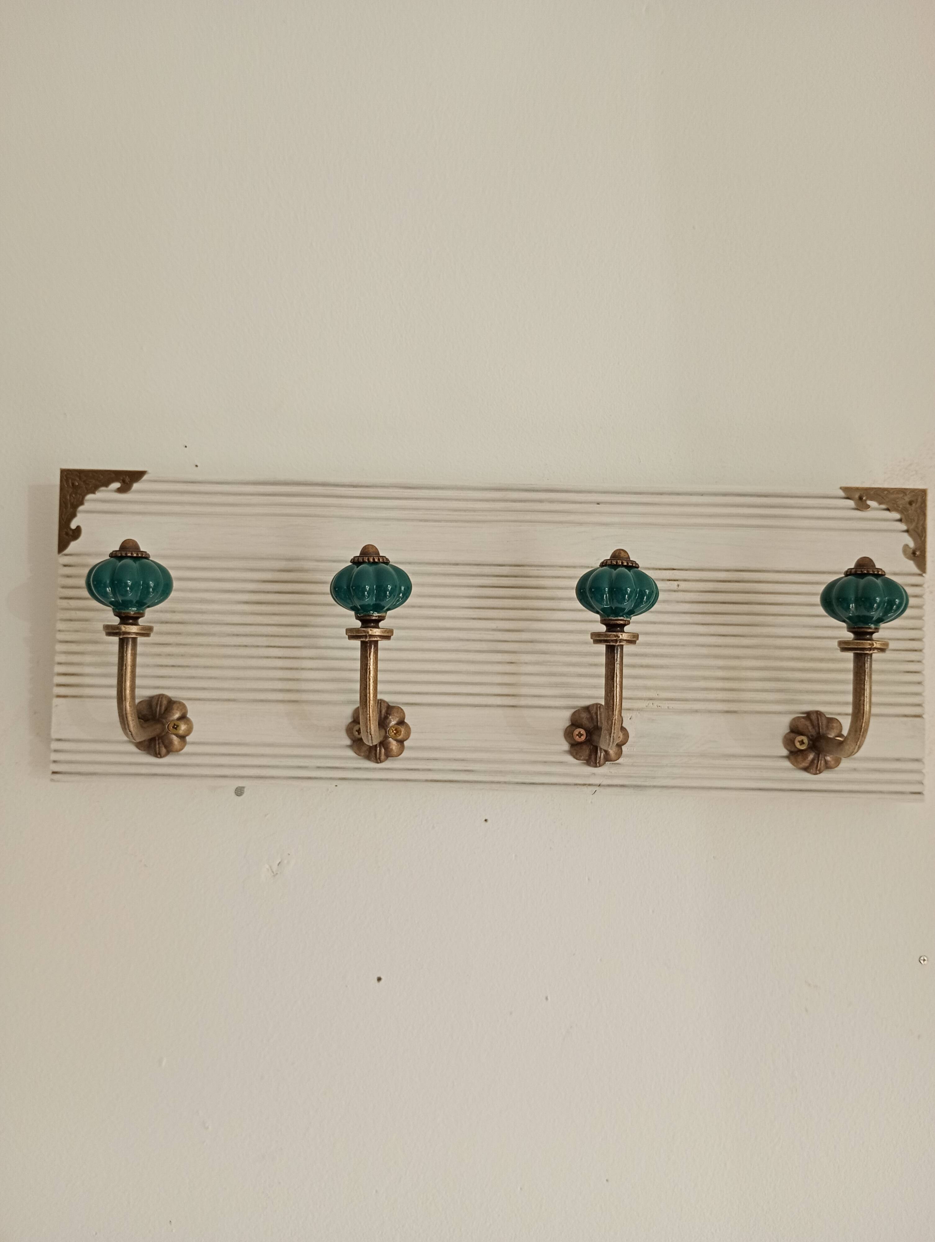 Wall-mounted coat rack in bleached wood and emerald green ceramic hooks –