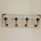 Wall-mounted coat rack in bleached wood and emerald green ceramic hooks –