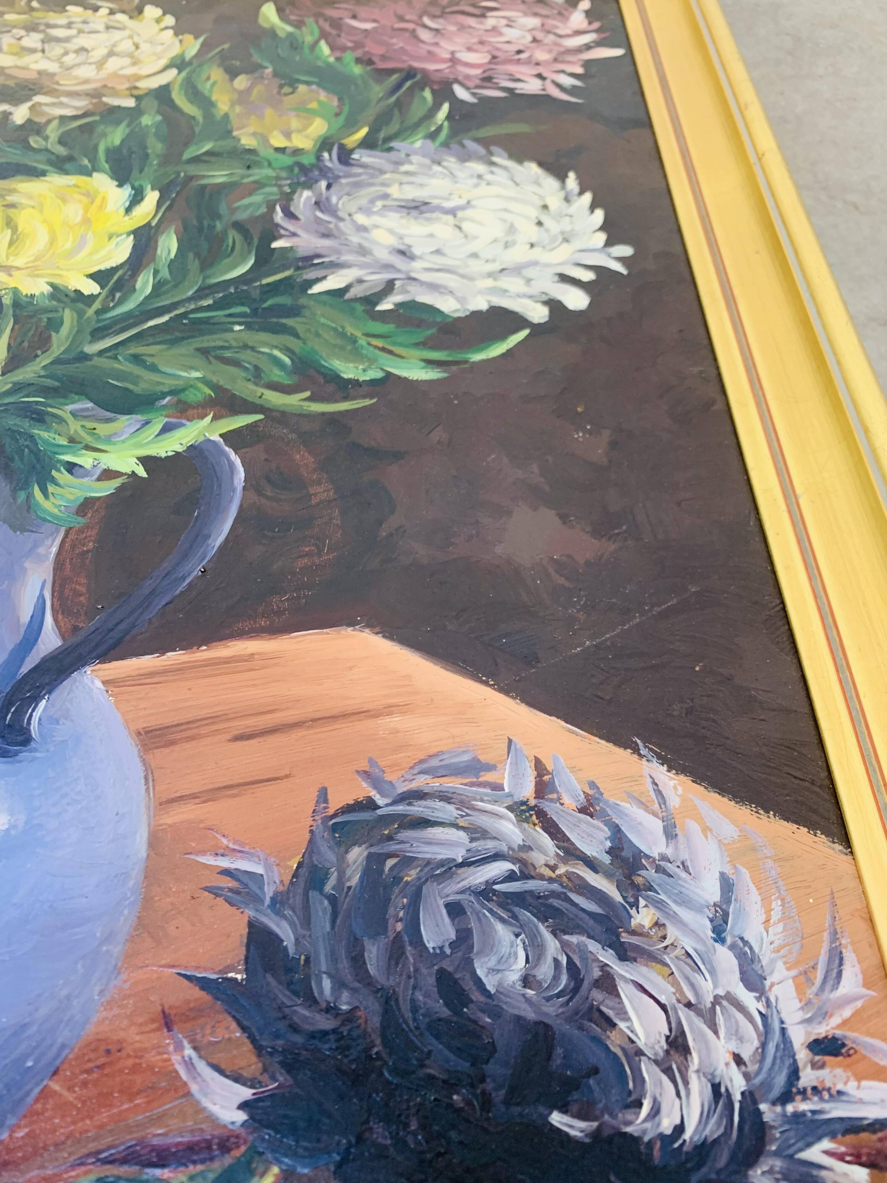 Still life painting of a bouquet of flowers, golden frame