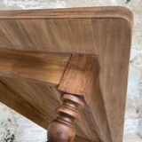 Vintage farmhouse table with turned legs.