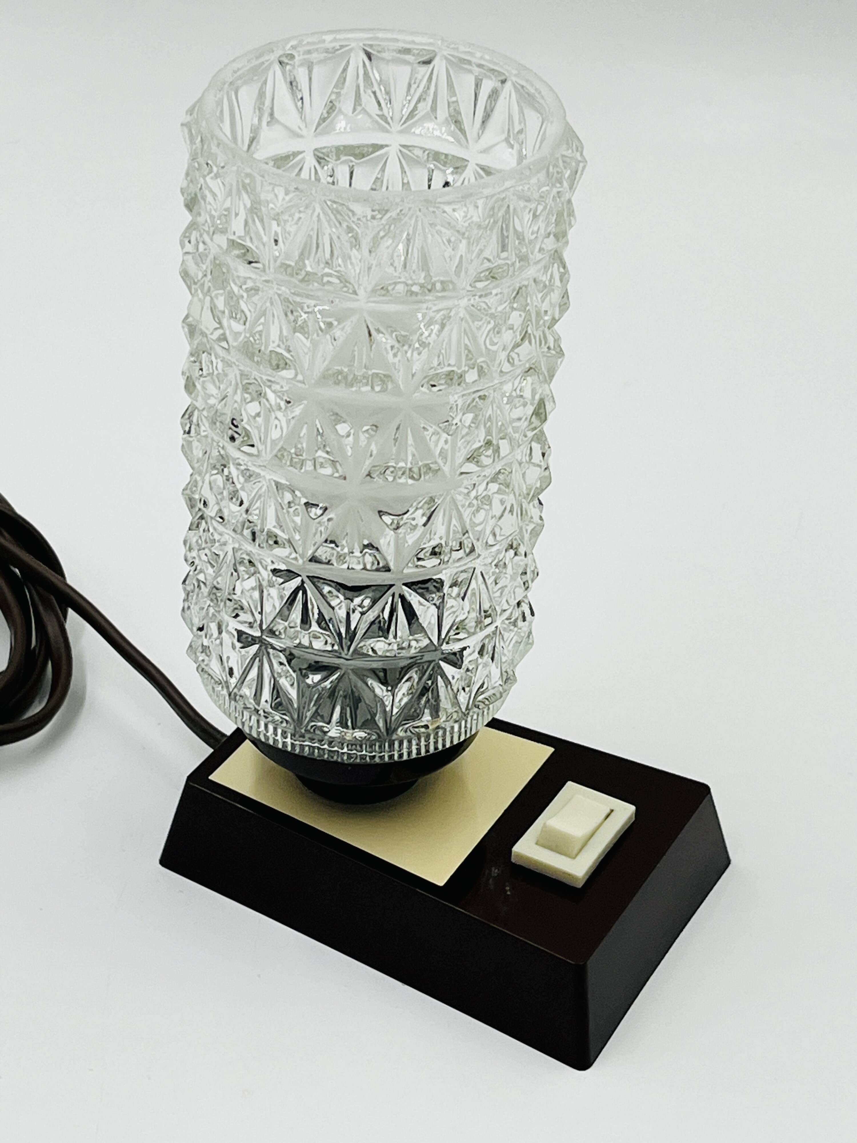 Massive bedside lamp in cut glass