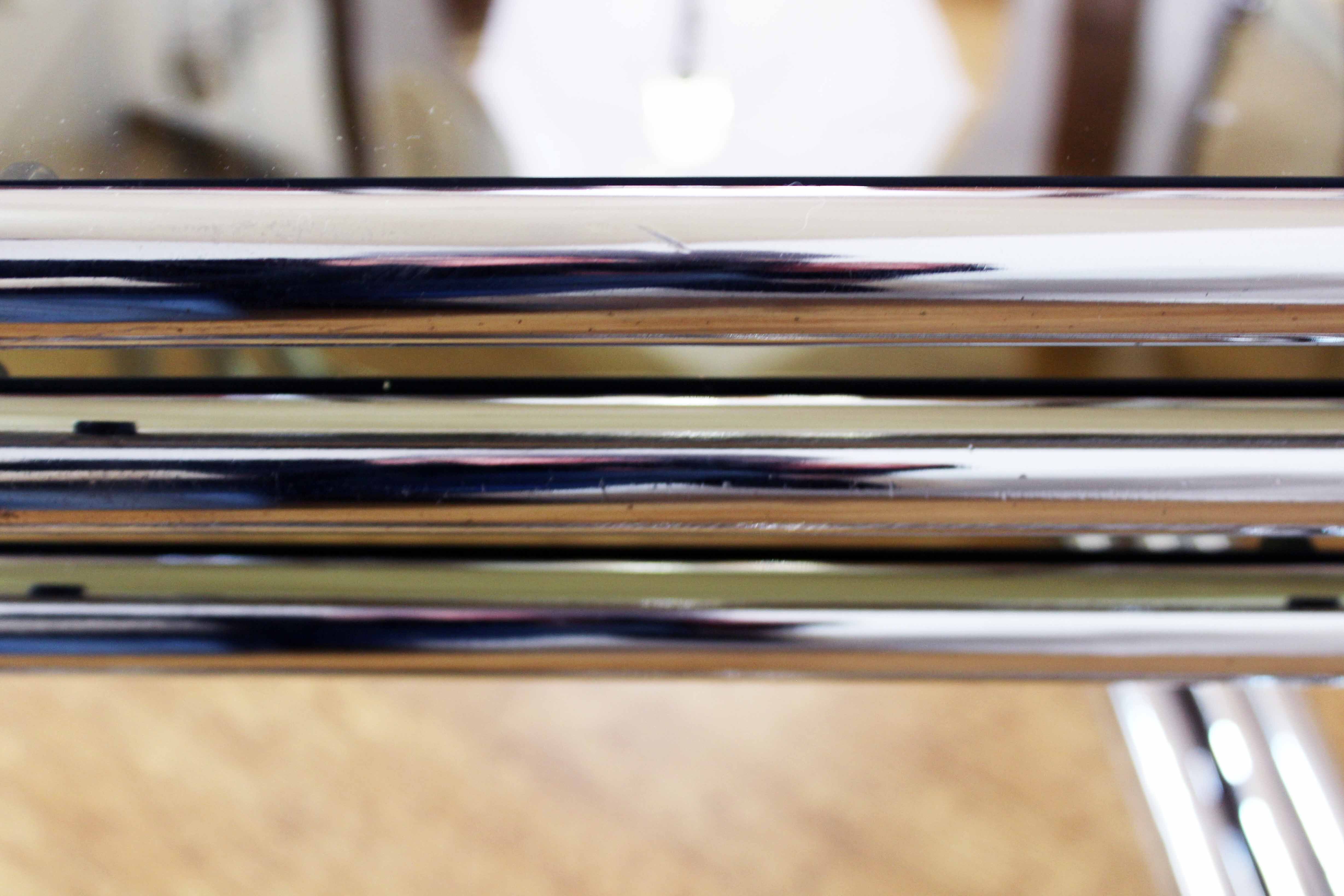 Bauhaus style metal and glass trundle tables