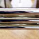 Bauhaus style metal and glass trundle tables