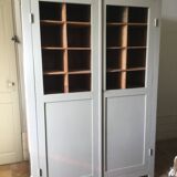 Antique Parisian wardrobe with interior compartments.