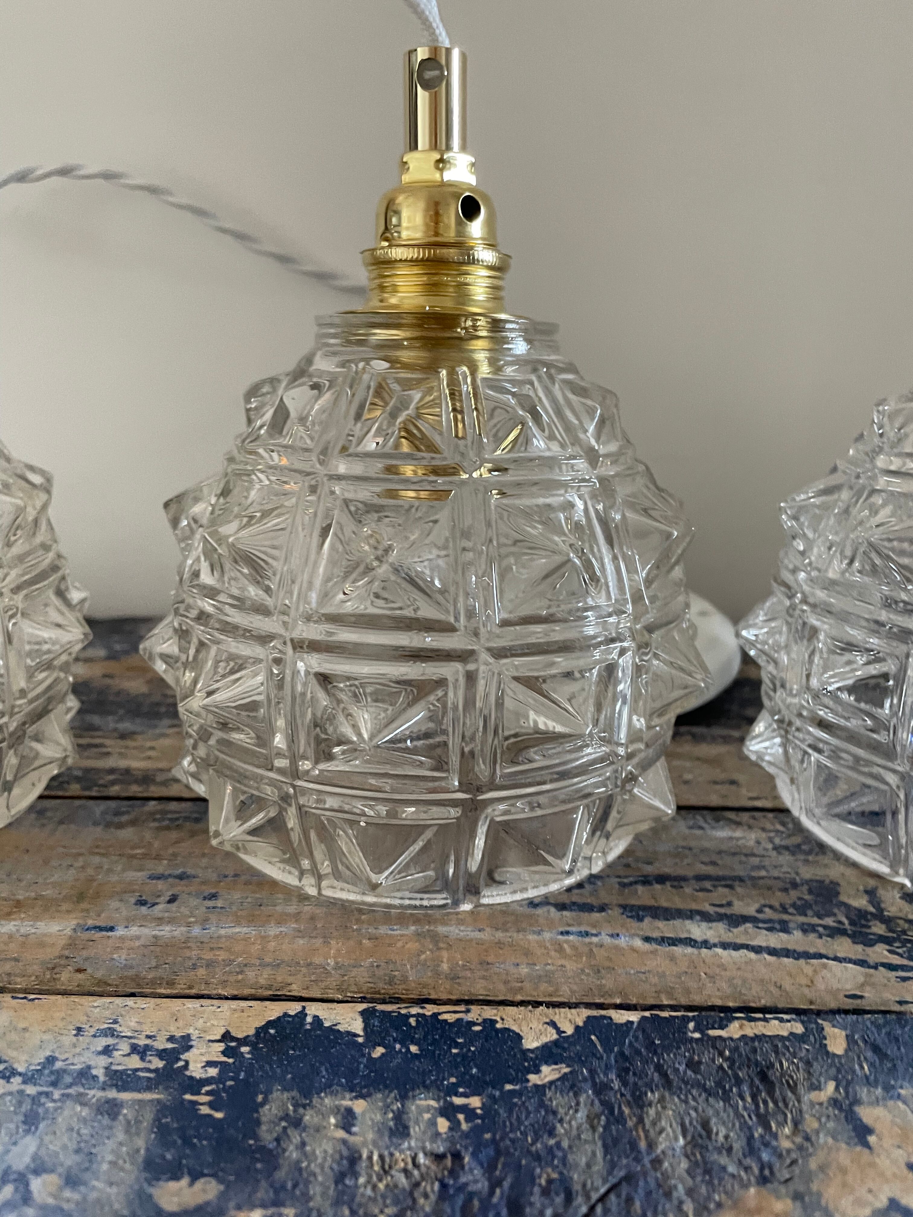 Set of three new electrified chiseled glass suspensions