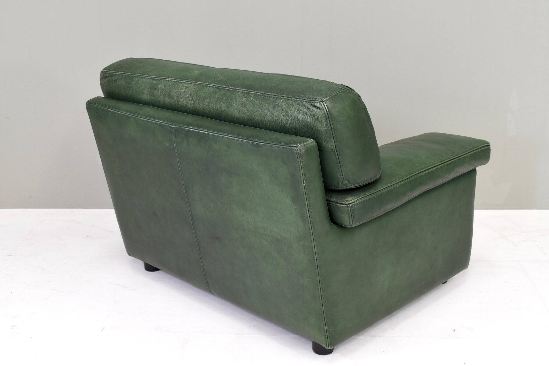 Roche Bobois lounge armchair in original green patinated leather, 1970