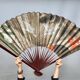 Large Art Deco fan with cranes and cupids in a cage