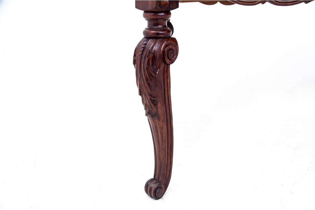 Antique table and chairs from the 19th century, Western Europe.