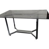 Chromed metal table with smoked glass top