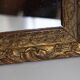 Antique mirror in gilded wood