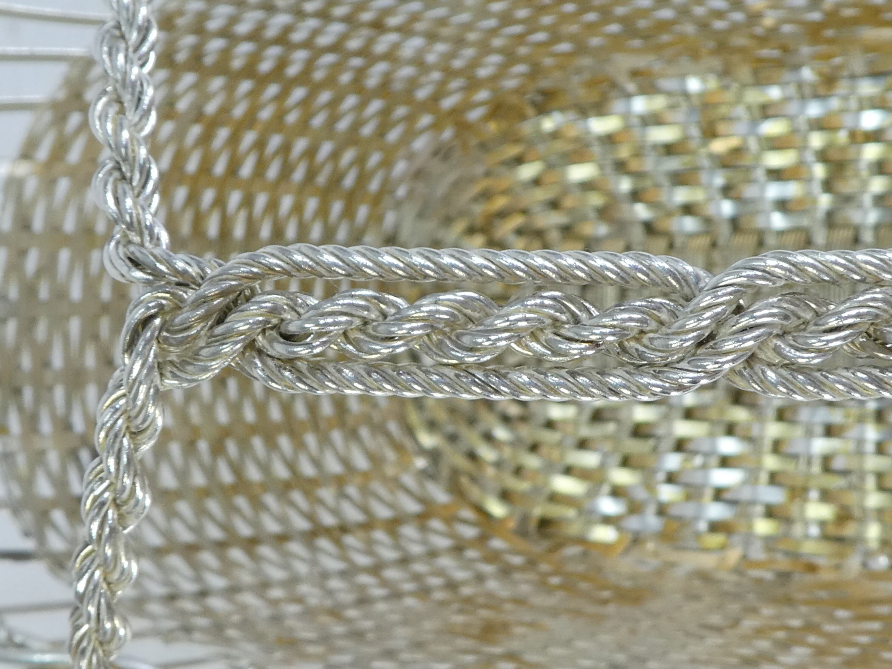 Christofle basket door silver metal bottle