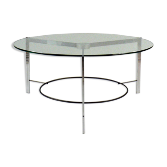 A low glass and steel table