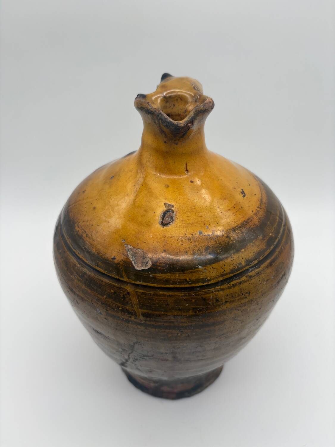 Yellow glazed terracotta pitcher, Spain, 19th century