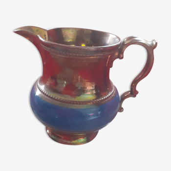 Ancient pitcher in enamelled sandstone " Jersey". Golden/ blue.