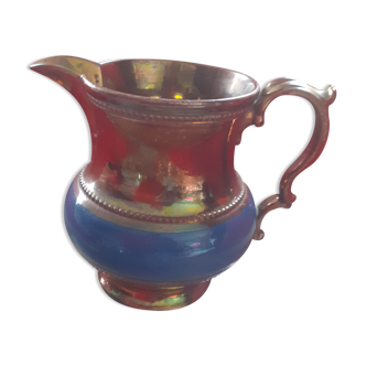 Ancient pitcher in enamelled sandstone " Jersey". Golden/ blue.