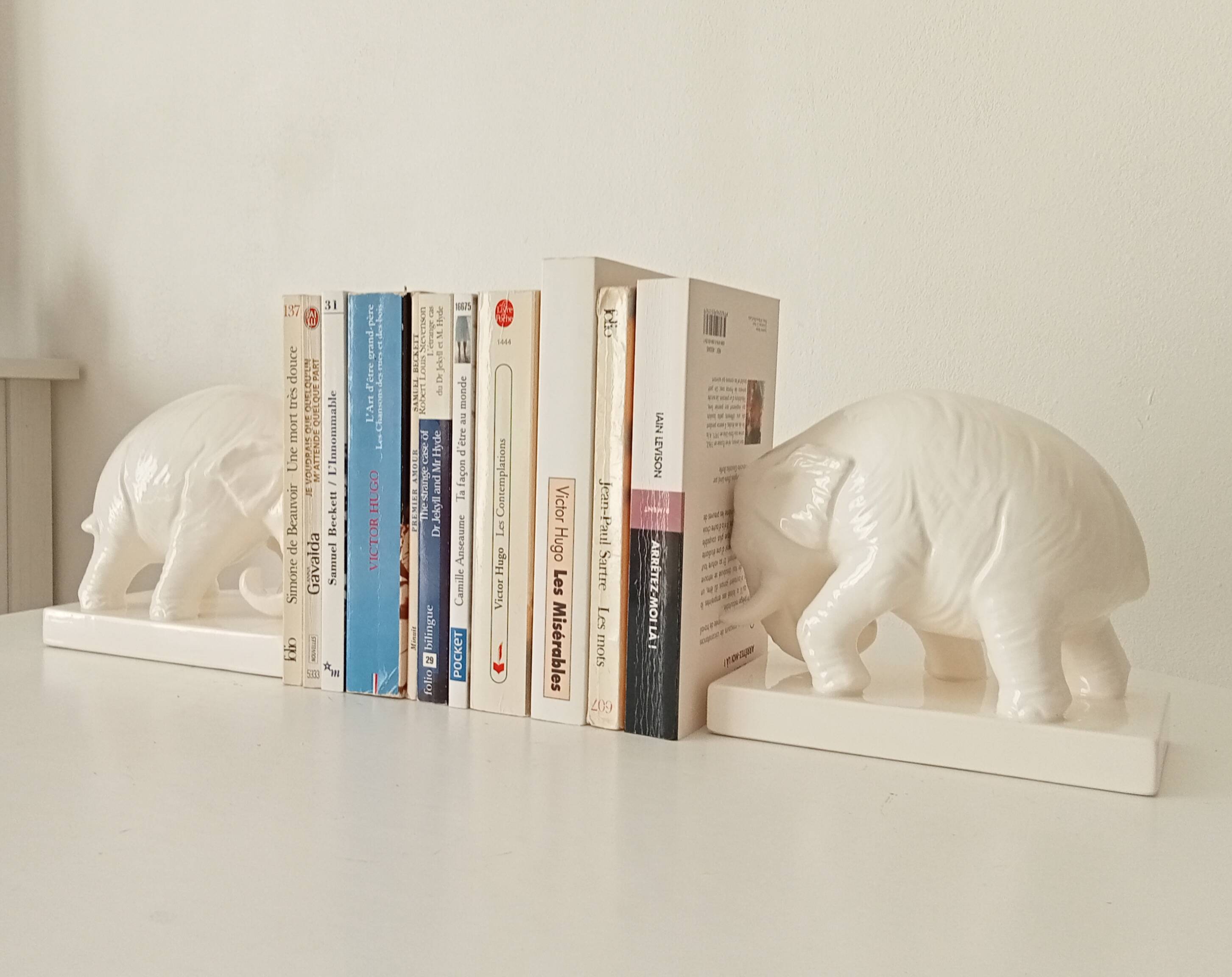 Pair of antique glazed ceramic bookends