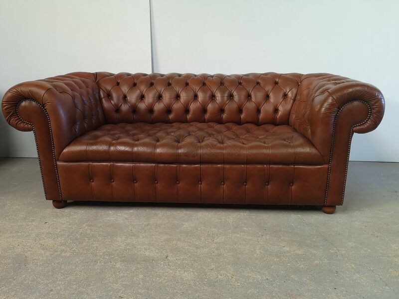 Light brown leather chesterfield sofa